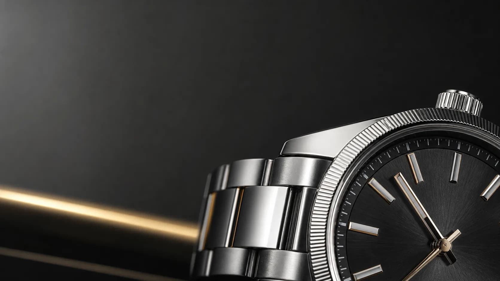 Close detail of a steel watch dial and bracelet
